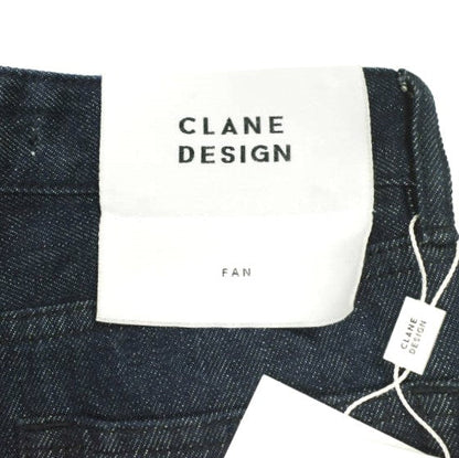 CLANE カラー ダイ ブーツ カット デニム パンツ