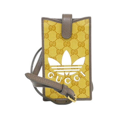 グッチ トレフォイルプリントGGクリスタルキャンバス フォンケース