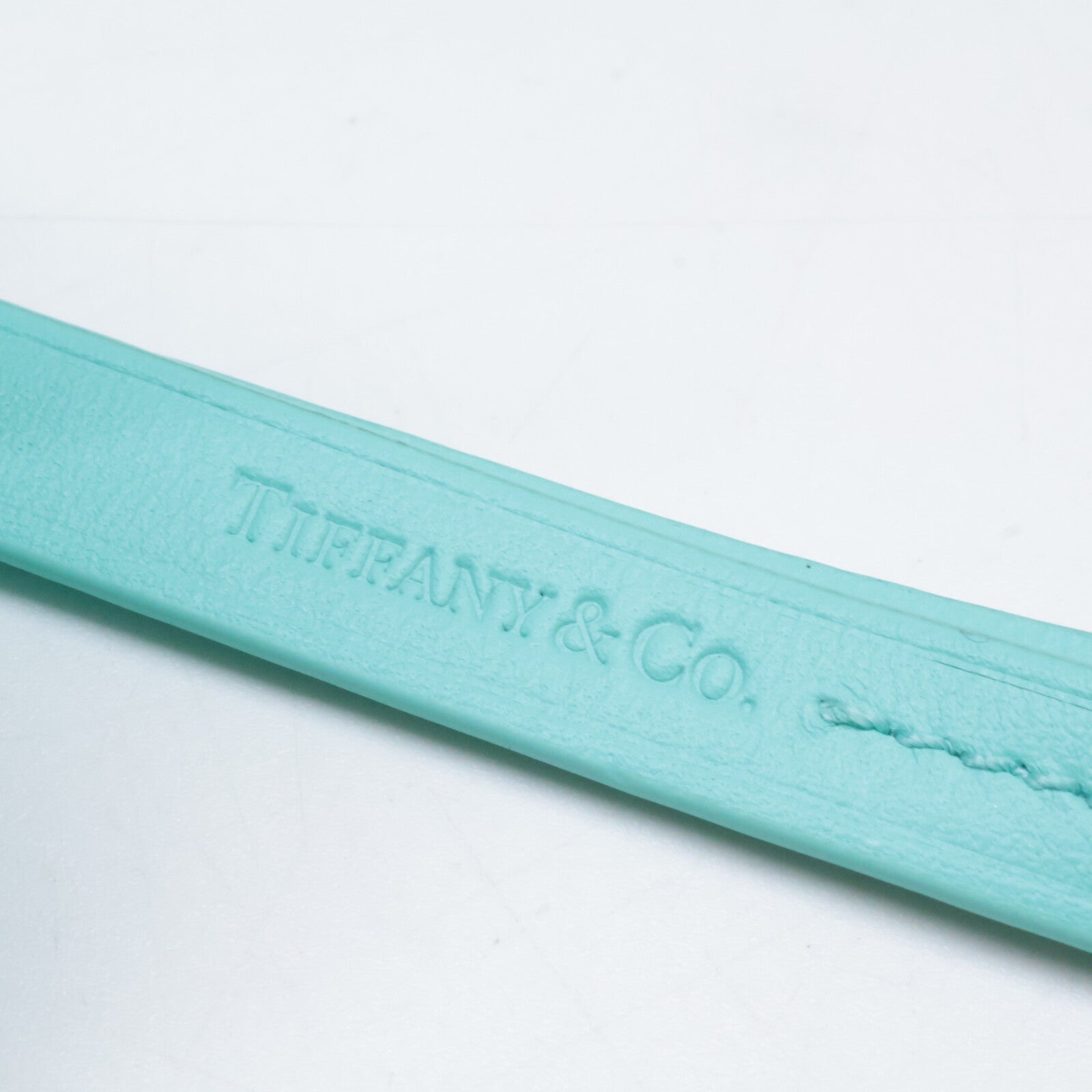 ティファニー フラワー レザー バッグ チャーム