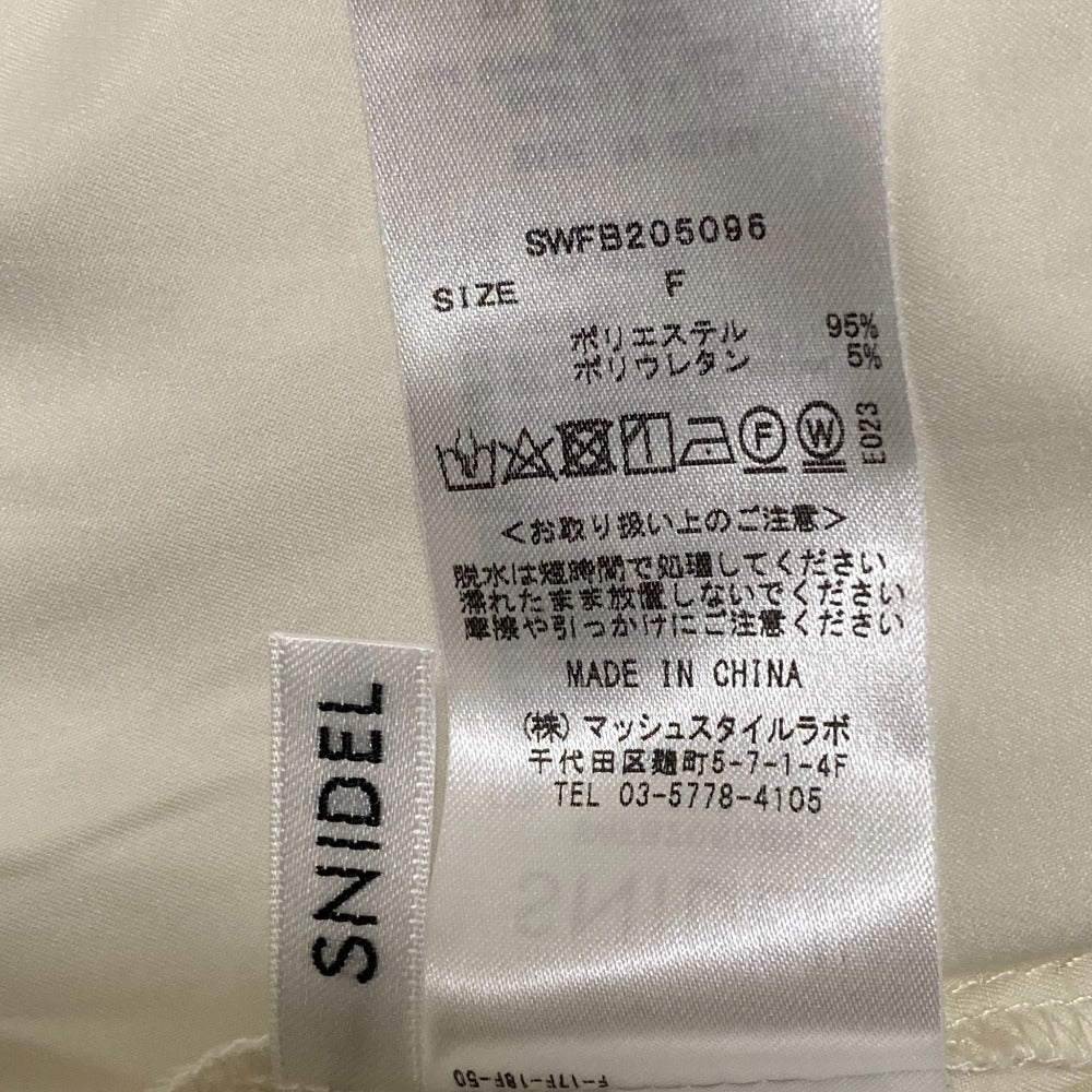 スナイデル エンボスシアーチュニックブラウス