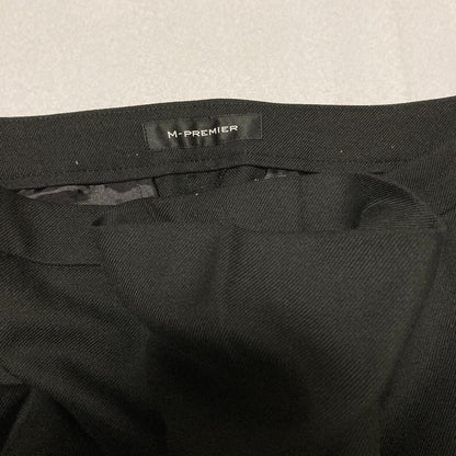 エムプルミエ ストレッチツイルテーパードパンツ