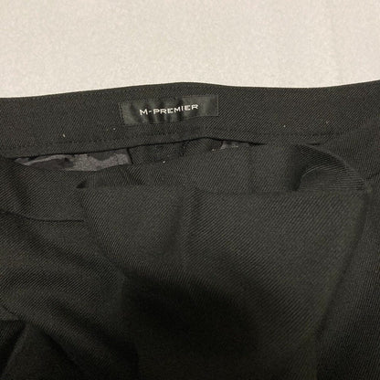エムプルミエ ストレッチツイルテーパードパンツ