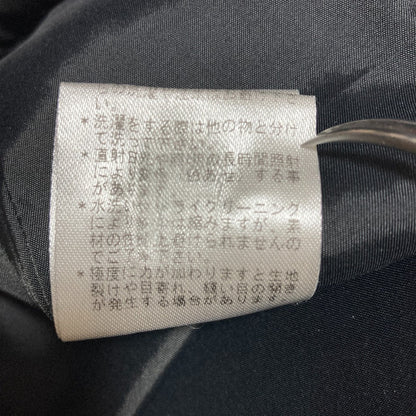 ロートレアモンロングノーカラーキルティングコート