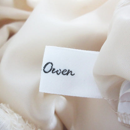ミラオーウェン シャギータックフレアロングスカート
