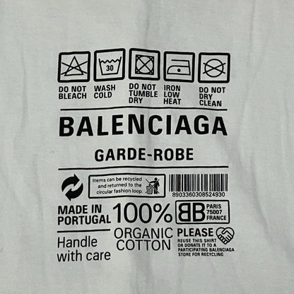 バレンシアガ ケアラベルプリント コットンオーバーサイズTシャツ