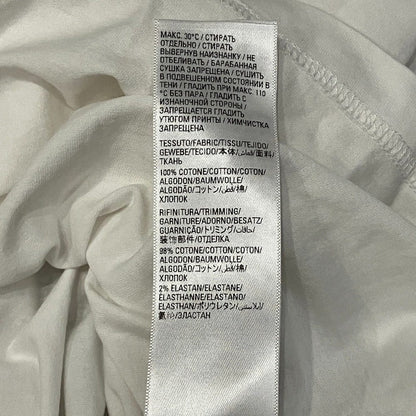 バレンシアガ ケアラベルプリント コットンオーバーサイズTシャツ