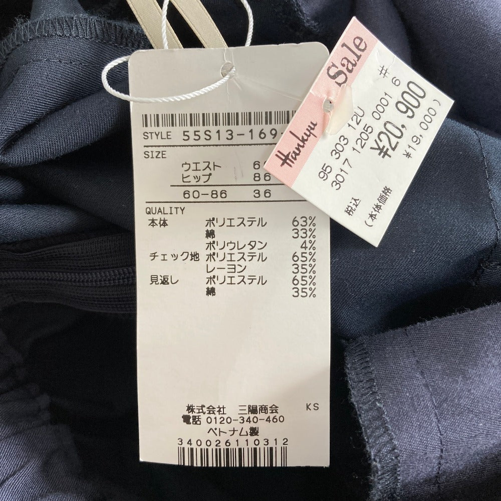 ブルーレーベルクレストブリッジ タックフレアスカート