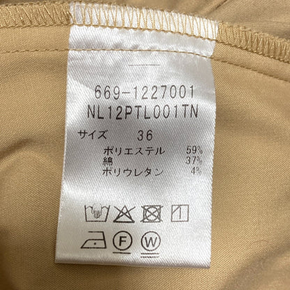 ナノユニバース テーパードパンツ