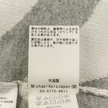 マイケルマイケルコース ニットフーデッドポンチョジャケット