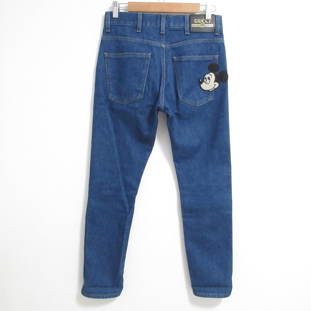 グッチ ディズニー限定デニムパンツ
