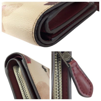 コーチ フローラル PVC レザー財布