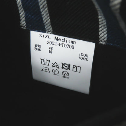 クオン TRIMMED TROUSERS コットンパンツ