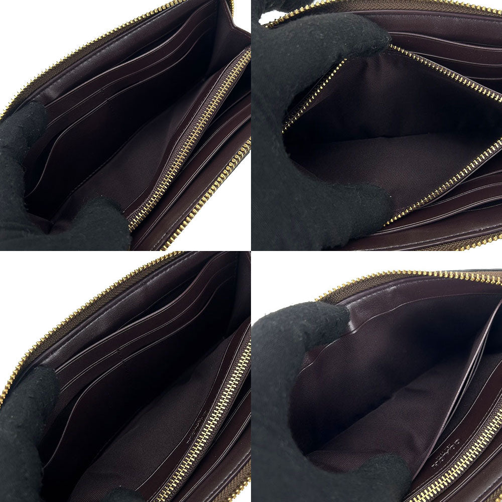 コーチ シグネチャー PVC レザー 長財布