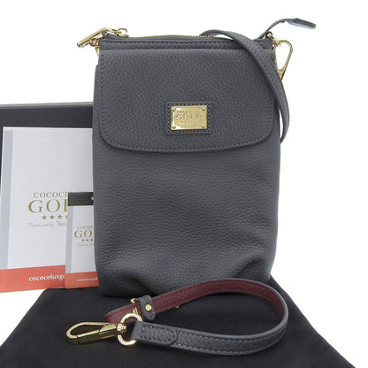 COCOCELUX GOLD レザー ヘラクレス ショルダー バッグ